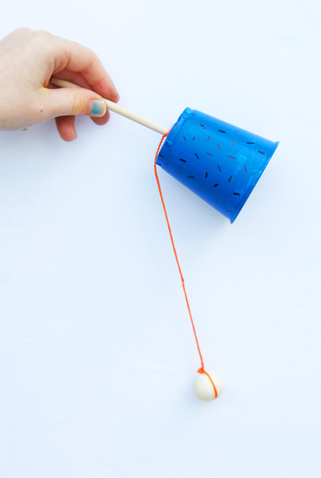 This cup and ball game craft is SO EASY to make and would be the perfect craft for a kids birthday party! 