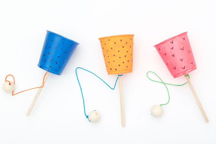 This cup and ball game craft is SO EASY to make and would be the perfect craft for a kids birthday party! 