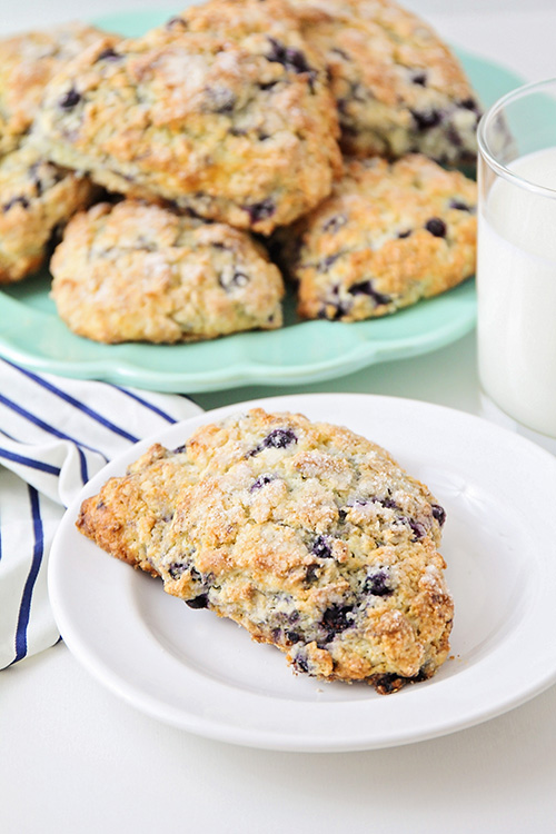 These wild blueberry scones are perfect for breakfast, brunch, or dessert! They're lightly sweetened, loaded with blueberries, and totally delicious!