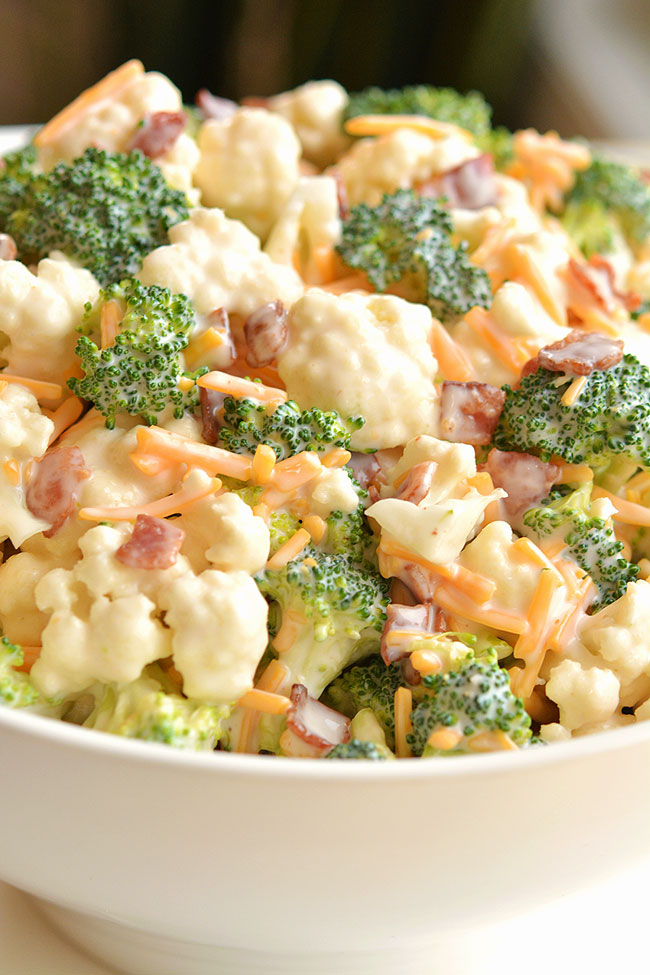 Cauliflower broccoli salad in a white bowl