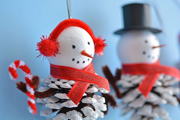Snowman ornaments made from pinecones