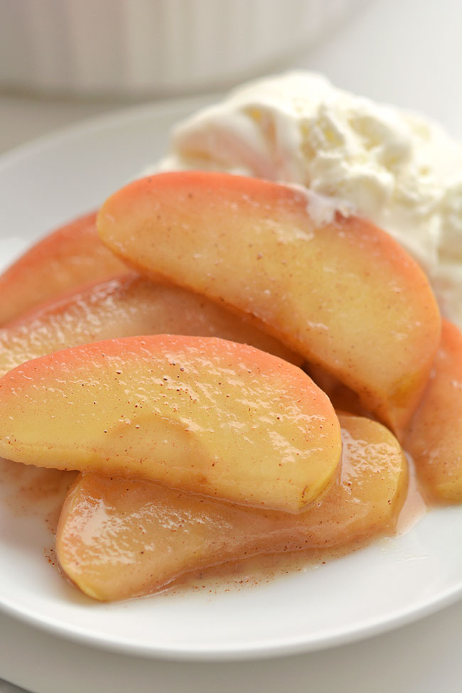 Sliced baked apples served with ice cream