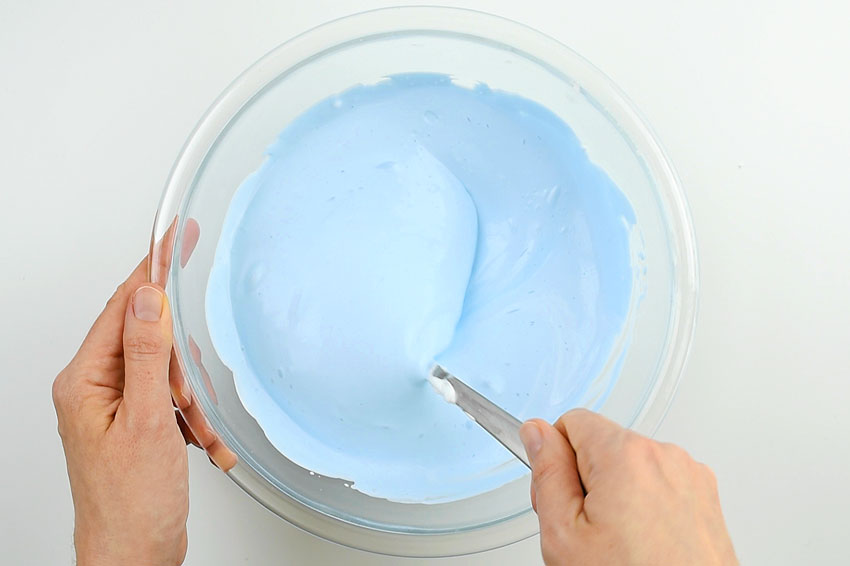 How to Make Fluffy Slime - Stirring the shaving cream.