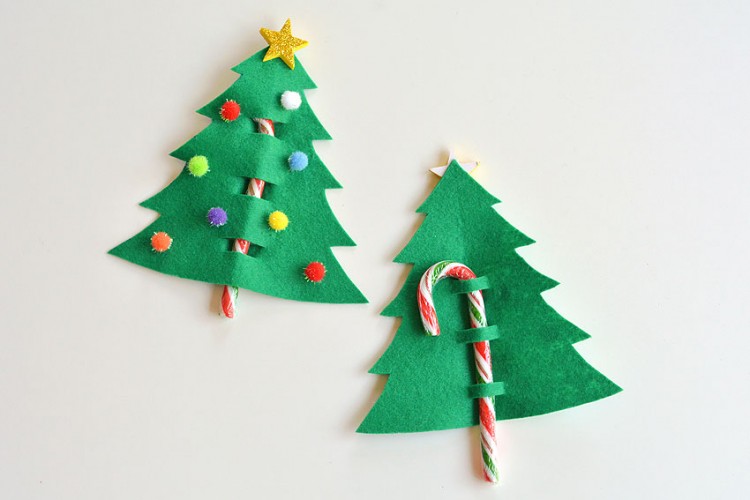 Felt Christmas tree candy cane favor decorated with pompoms
