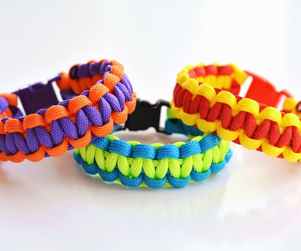 Three paracord bracelets on a white background