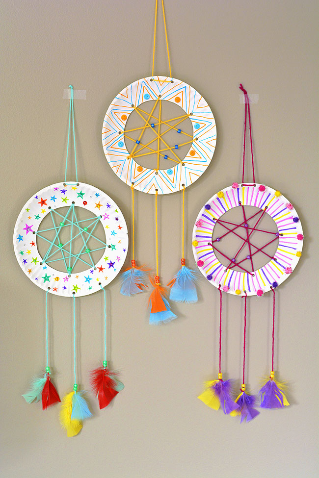 Three dreamcatchers hanging on a wall