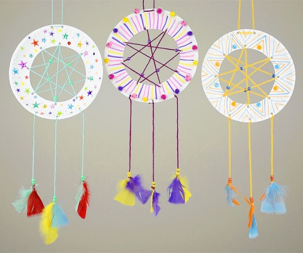Three dreamcatchers hanging beside each other