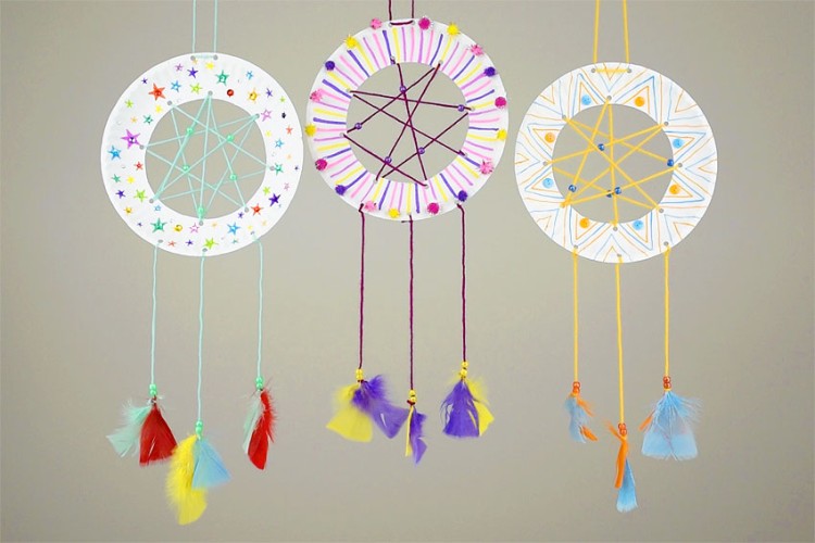 Three dreamcatchers hanging beside each other