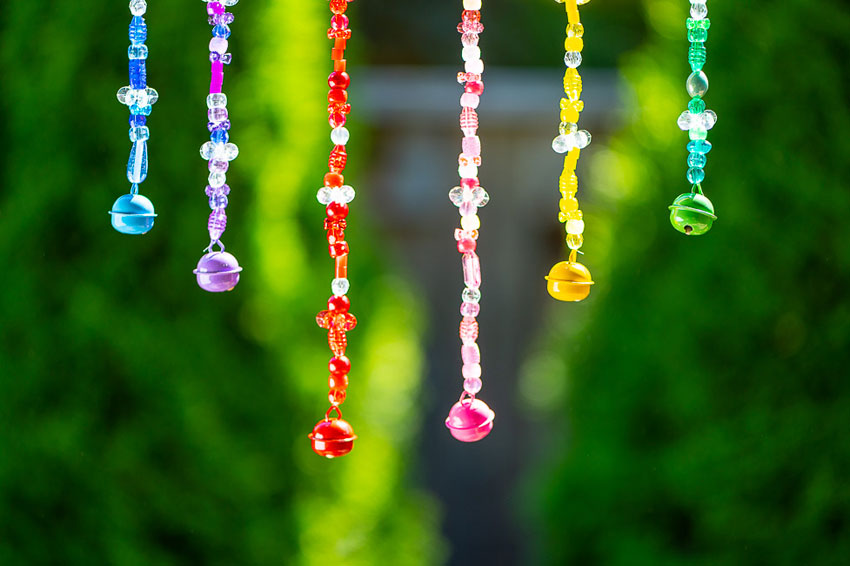 Closeup of bottom of strands on a homemade wind chime