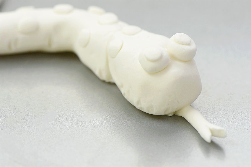 Homemade clay formed into a snake