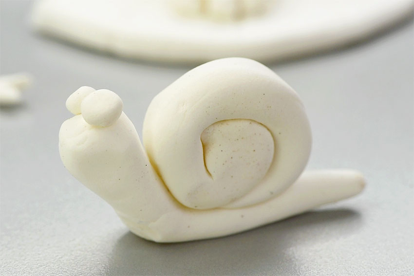 Homemade clay formed into a snail