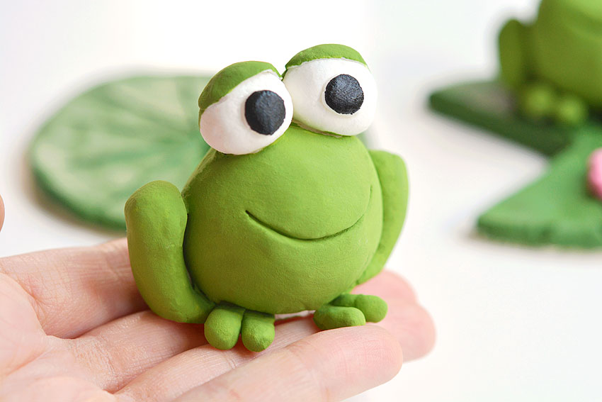Closeup of a clay frog sculpture