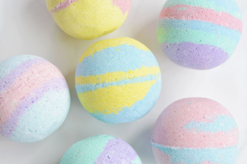 Bath bombs sitting on a white background
