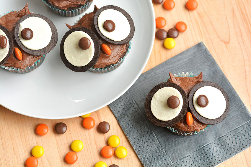 A grouping of owl oreo cupcakes