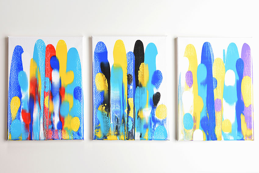 Three paintings made with squeegees