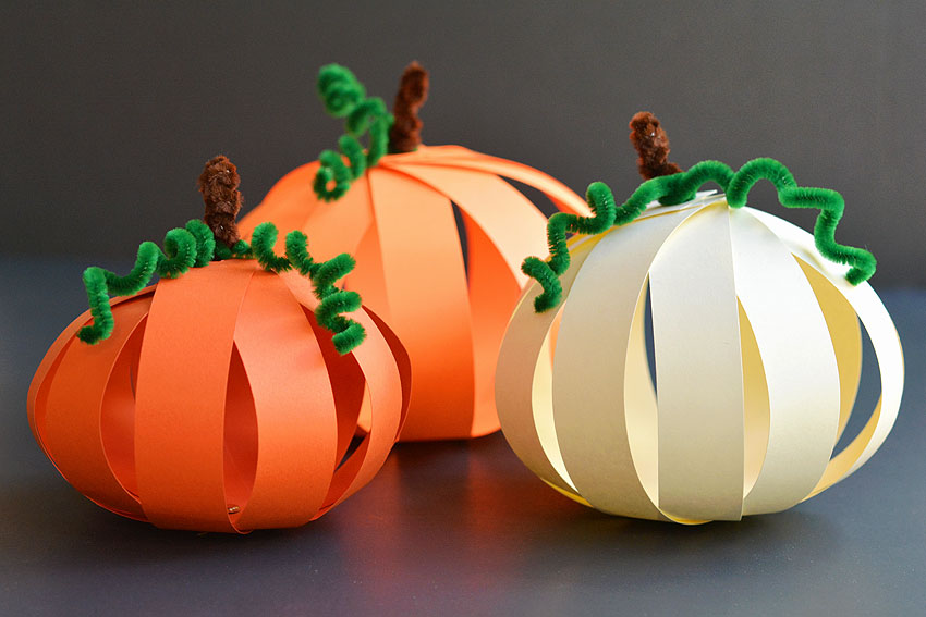 Group of three paper pumpkin crafts