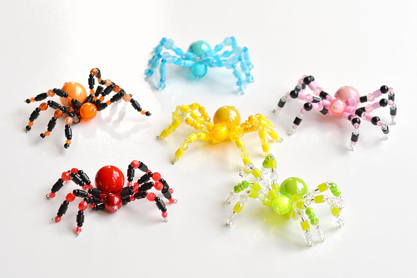 Beaded spiders on a white background
