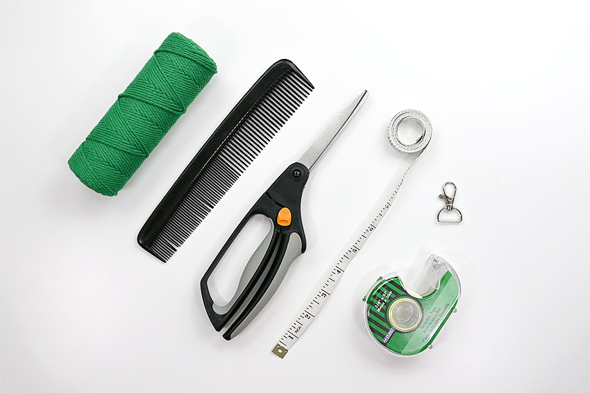 Supplies for making a macrame keychain 