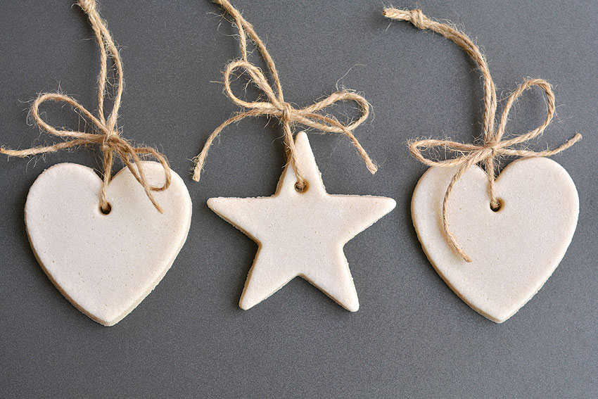 Three salt dough ornaments tied with twine
