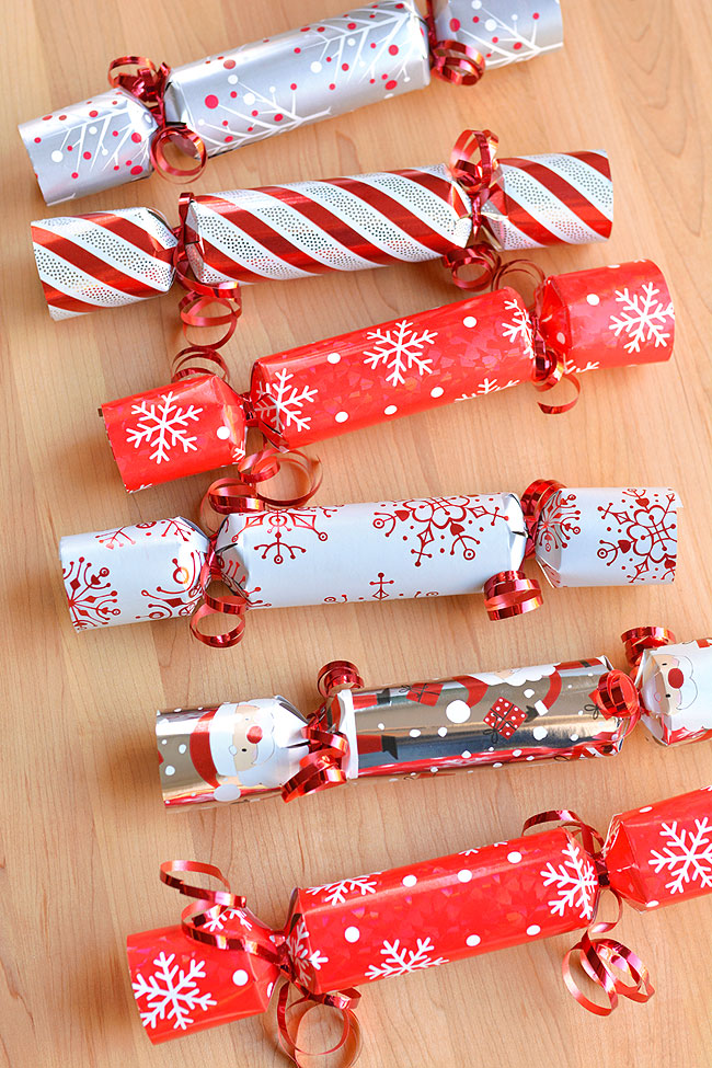 DIY Christmas crackers on a wooden background