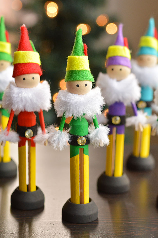 A group of colourful clothespin elves