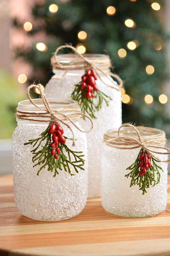 Three sizes of DIY snowy mason jars