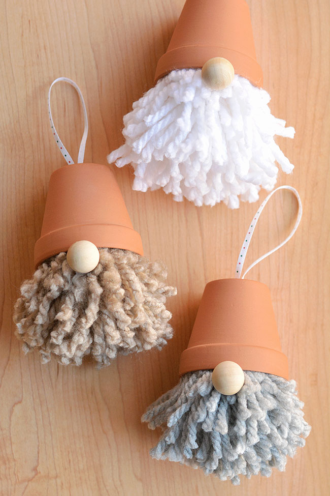 Three gnome ornaments with different colour beards
