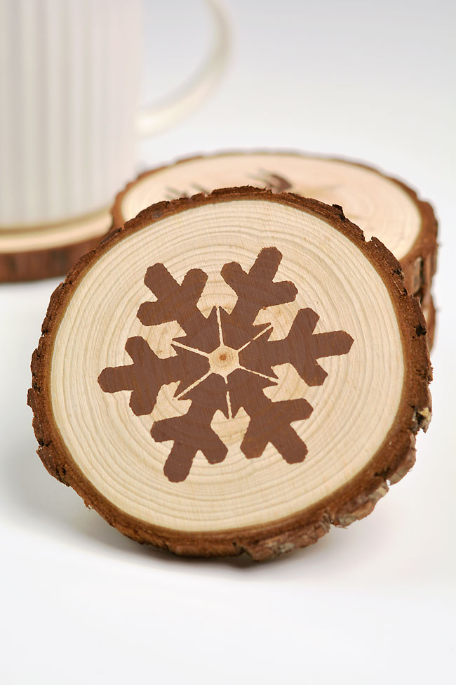 Snowflake DIY coaster made with a wood slice