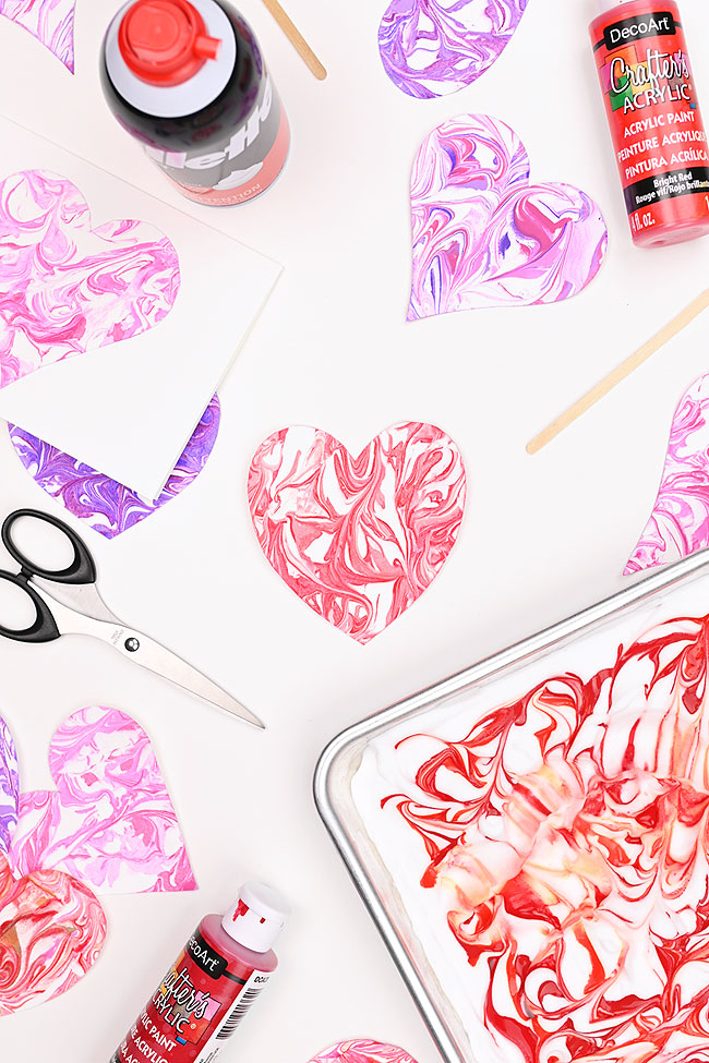 Paper hearts made with shaving cream marbling