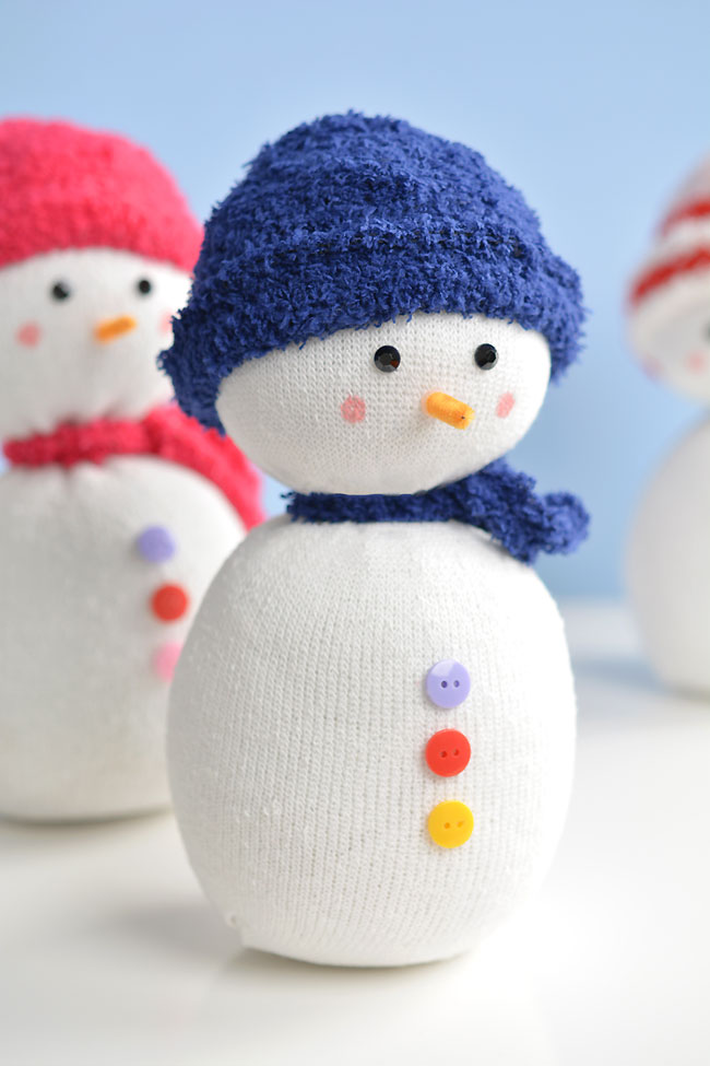 Sock snowman with a blue hat