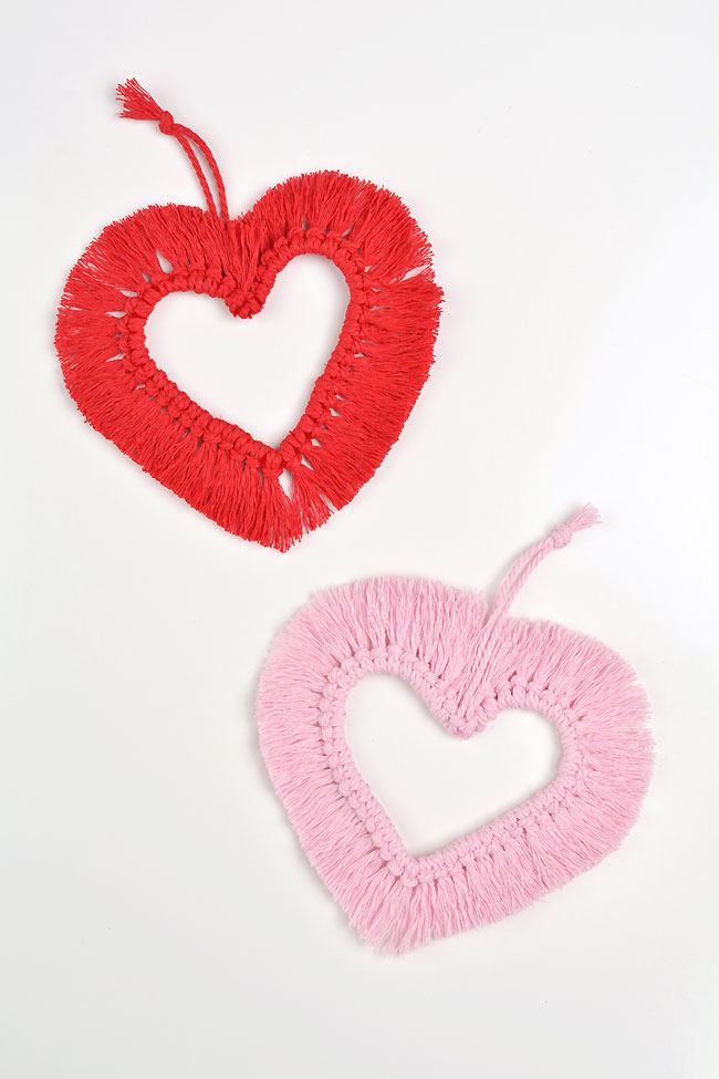 Red and pink heart shapes made from macrame cord and pipe cleaner
