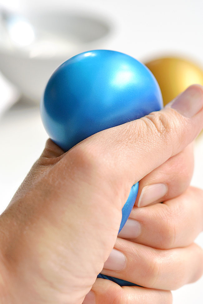 Cornstarch stress ball in a hand