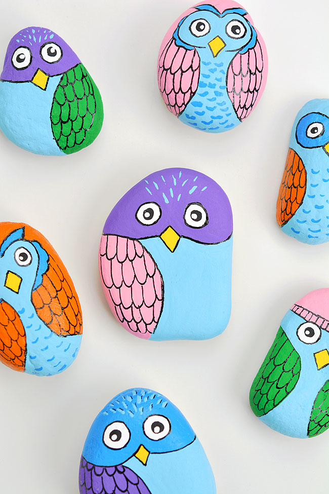 Cute owls painted on flat rocks