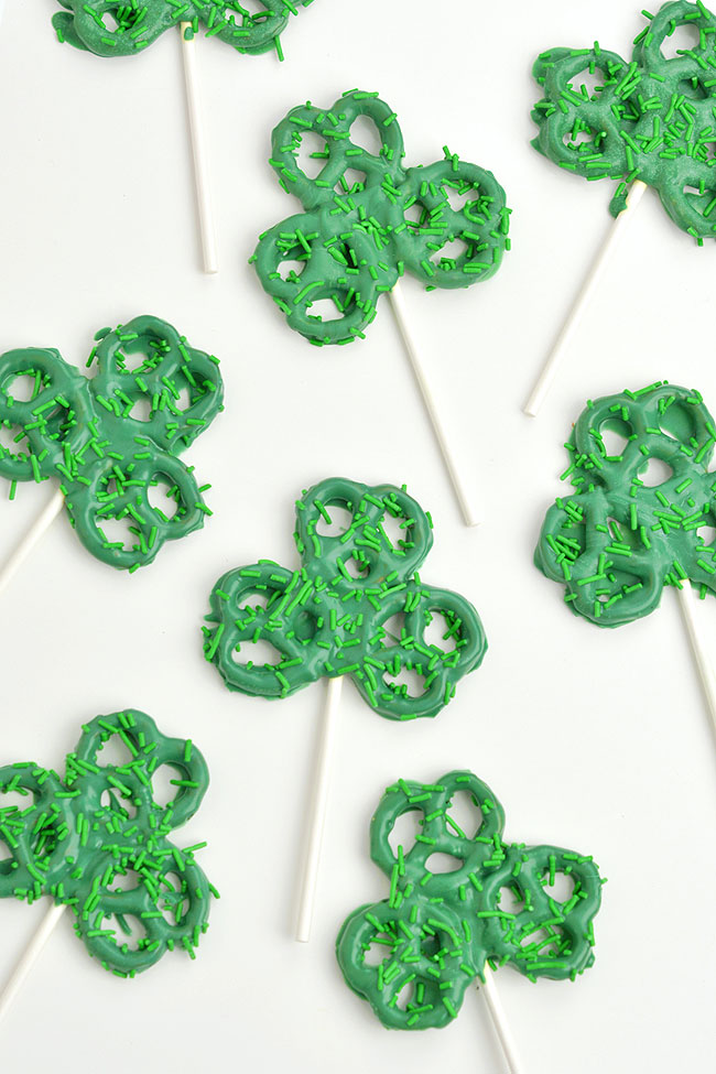 Fun grouping of St Patrick's Day pretzels on a white background