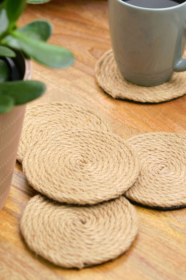 Twine coasters on a wooden table