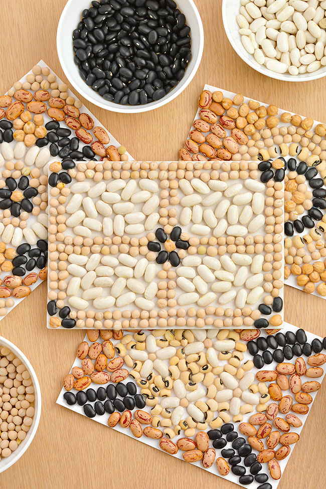 Mosaic made with beans glued to a canvas