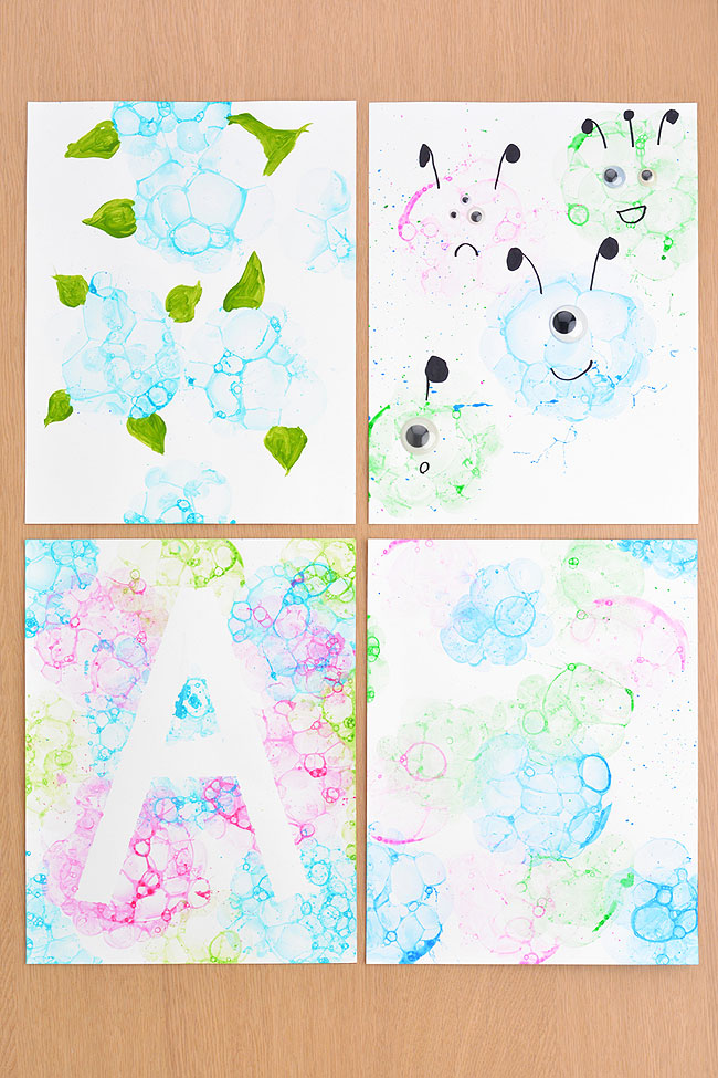 Bubble painting flowers, aliens, and tape resist art