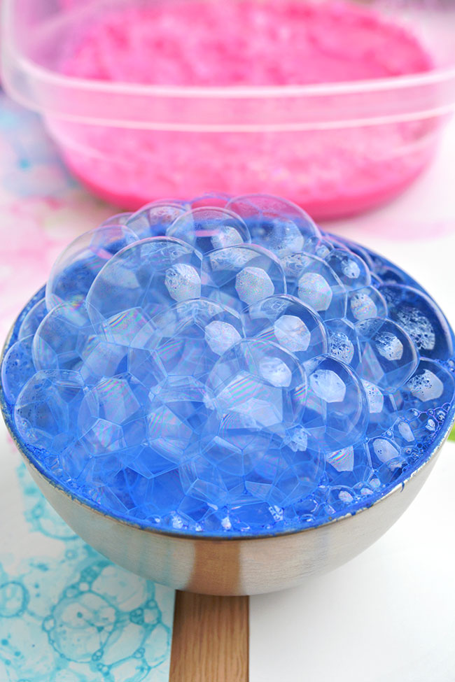 Blue and pink paint bubbles in bowls