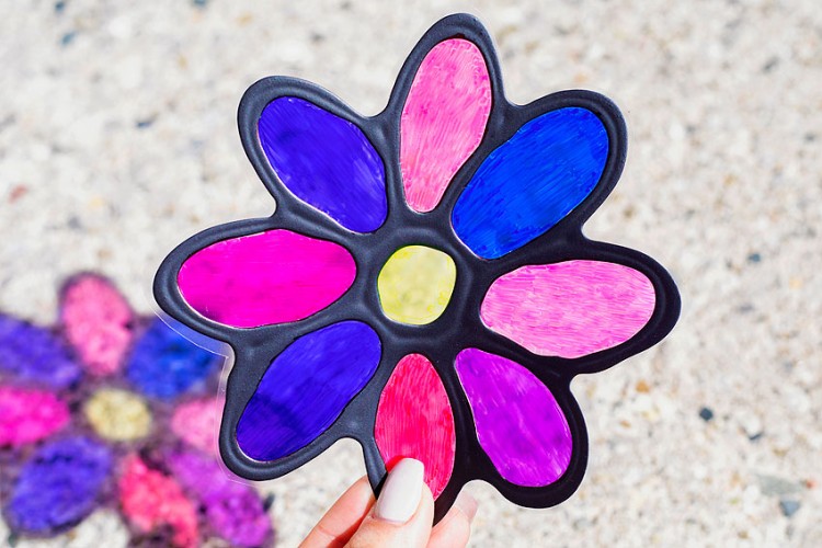 Suncatcher craft with black glue and markers