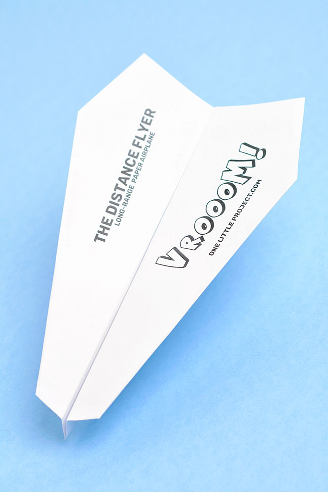 Airplane paper template printed and folded into a glider paper plane