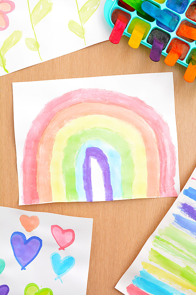 Rainbow and heart paintings made with colored ice cubes