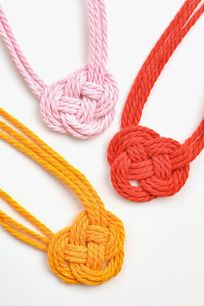 Closeup of a Celtic heart knot on DIY macrame necklaces