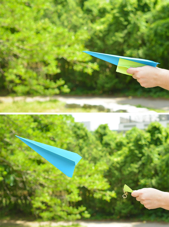 Paper airplane launcher sending a plane flying