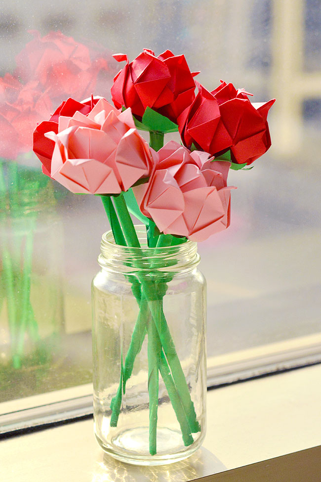 Paper roses in a vase on a windowsill