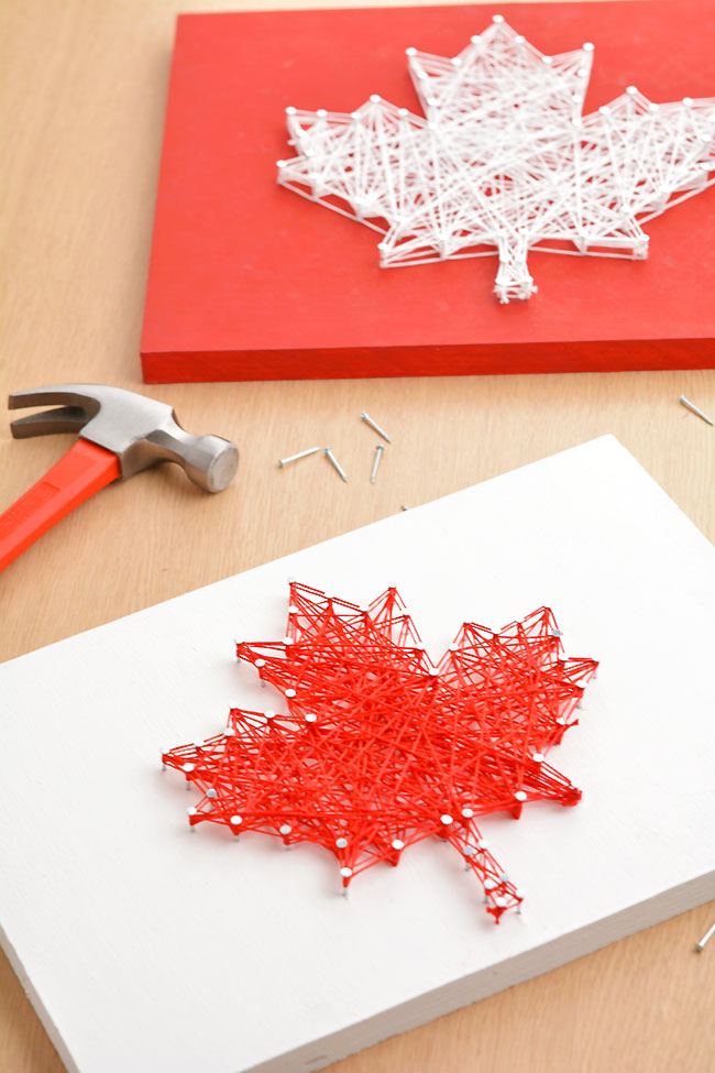 Canada Day string art craft with a hammer and nails