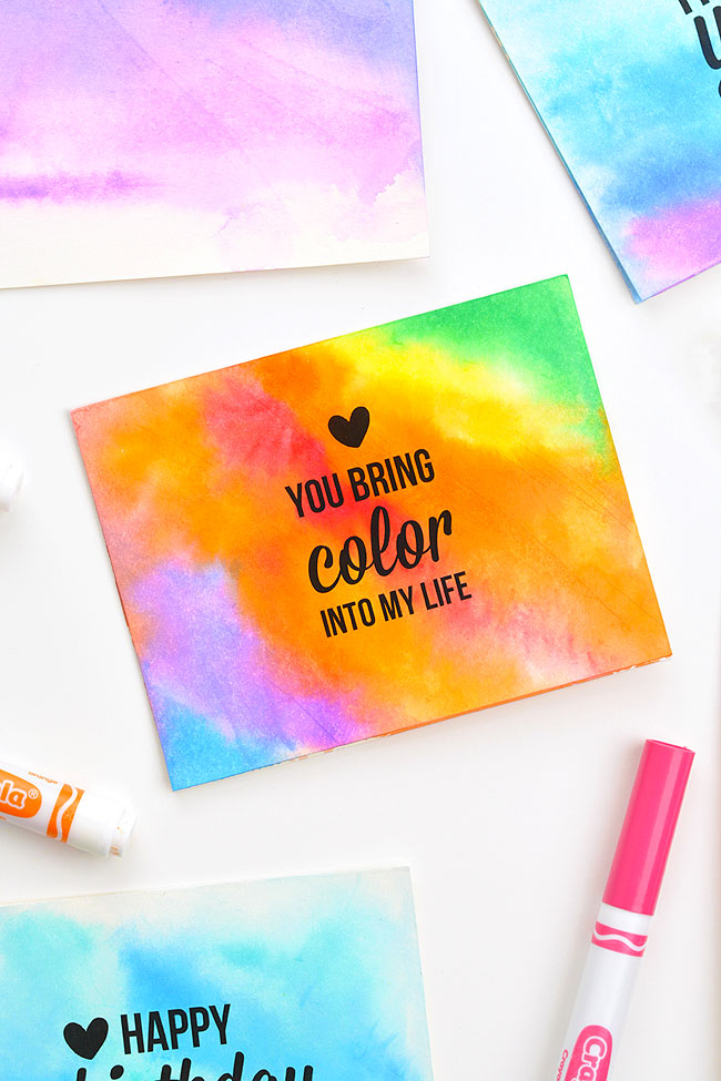 Rainbow colored watercolor knockoff card