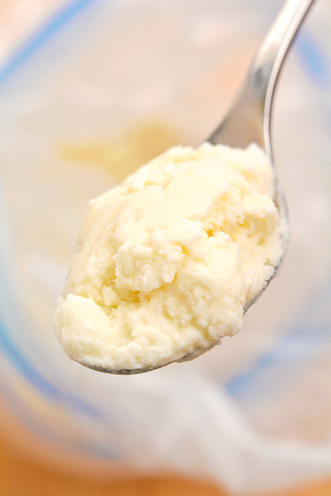 Closeup of a spoon of ice cream made in a bag