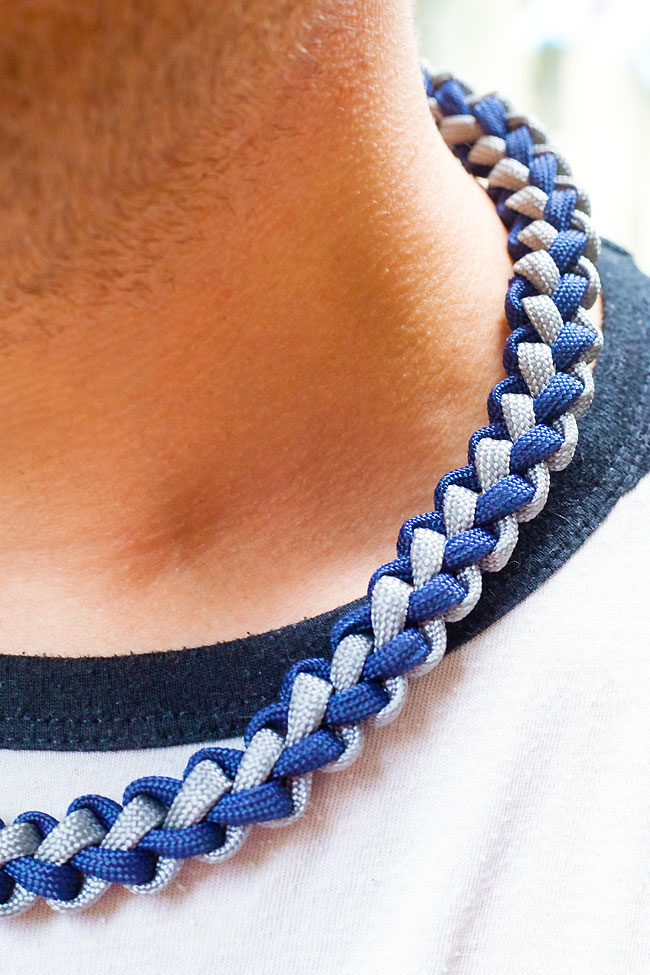 Side angle of a DIY paracord necklace made with zipper sinnet pattern