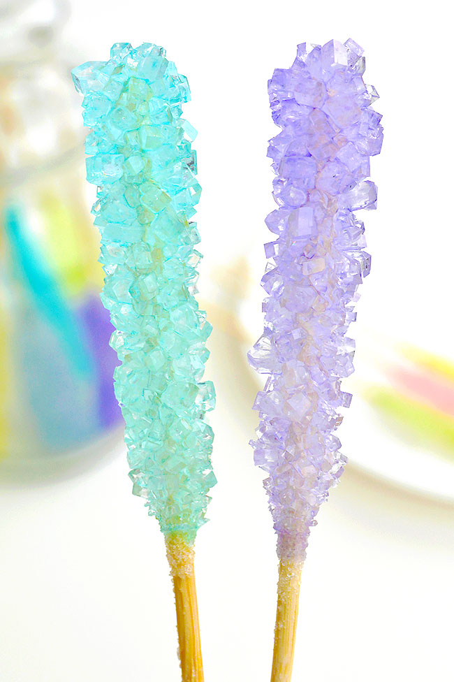 Blue and purple DIY rock candy on a stick