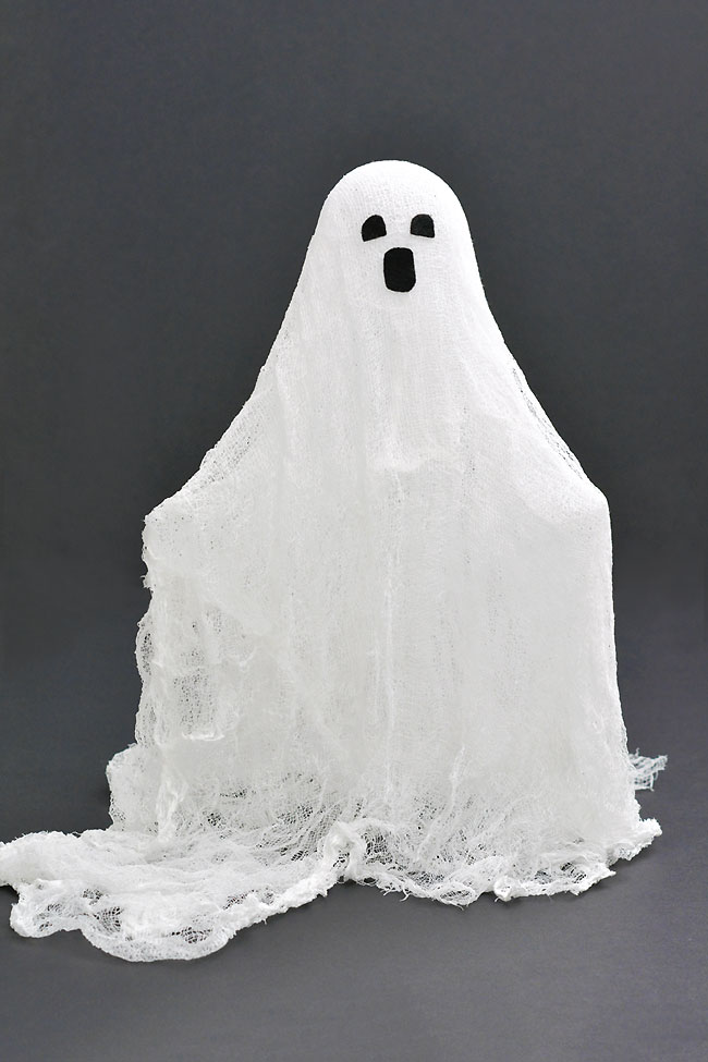 Spooky cheesecloth ghost with arms